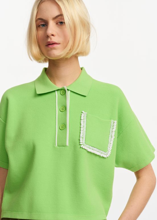 Green polo top with beaded embroidery