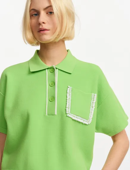 Green polo top with beaded embroidery