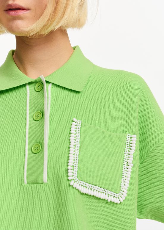 Green polo top with beaded embroidery