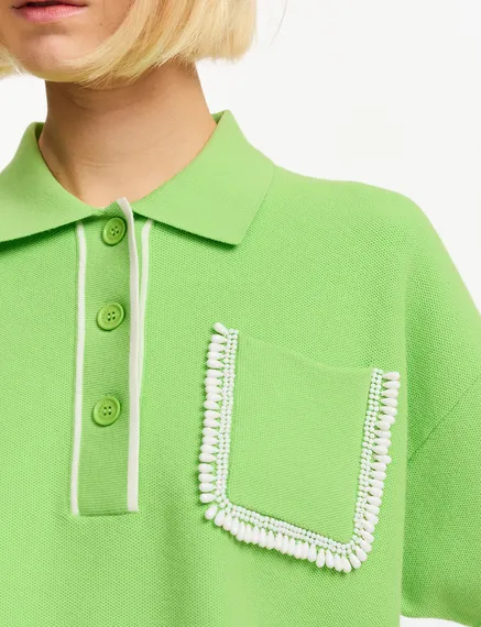 Green polo top with beaded embroidery