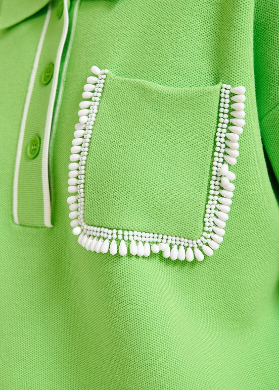 Green polo top with beaded embroidery