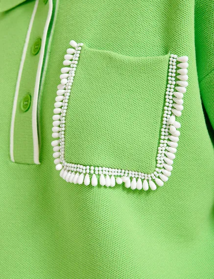 Green polo top with beaded embroidery