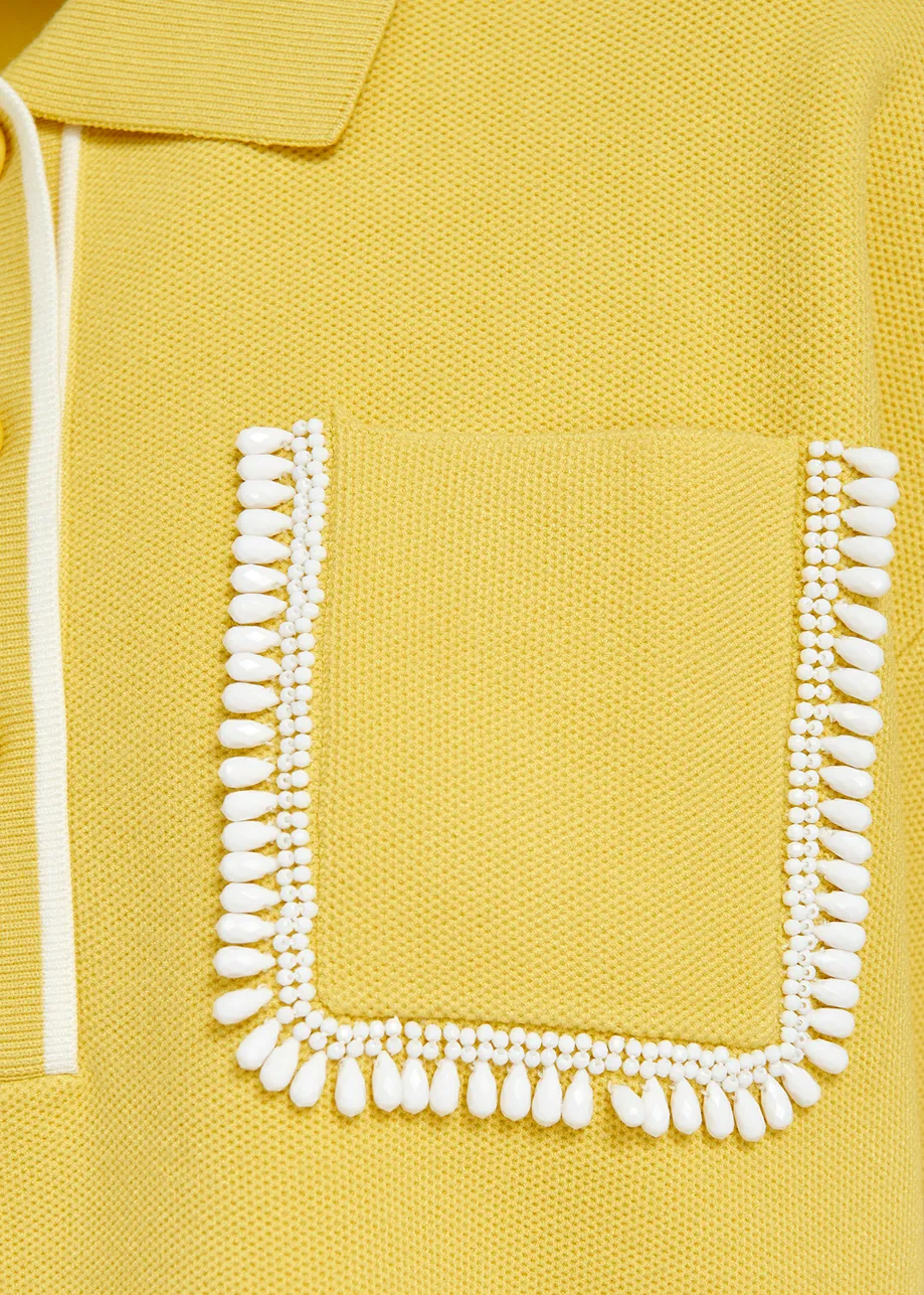 Yellow polo top with beaded embroidery