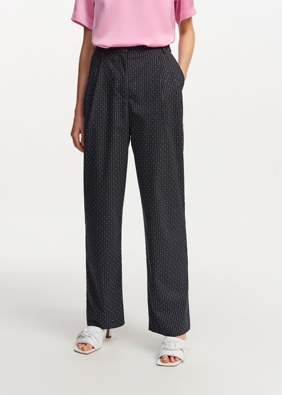 Navy blue pinstriped pants with rhinestone embellishments