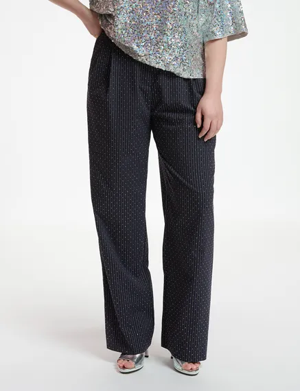 Navy blue pinstriped pants with rhinestone embellishments