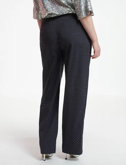 Navy blue pinstriped pants with rhinestone embellishments