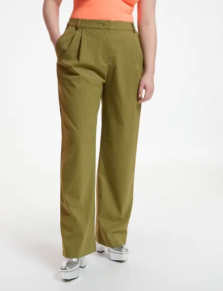 Khaki pinstriped pants with rhinestone embellishments