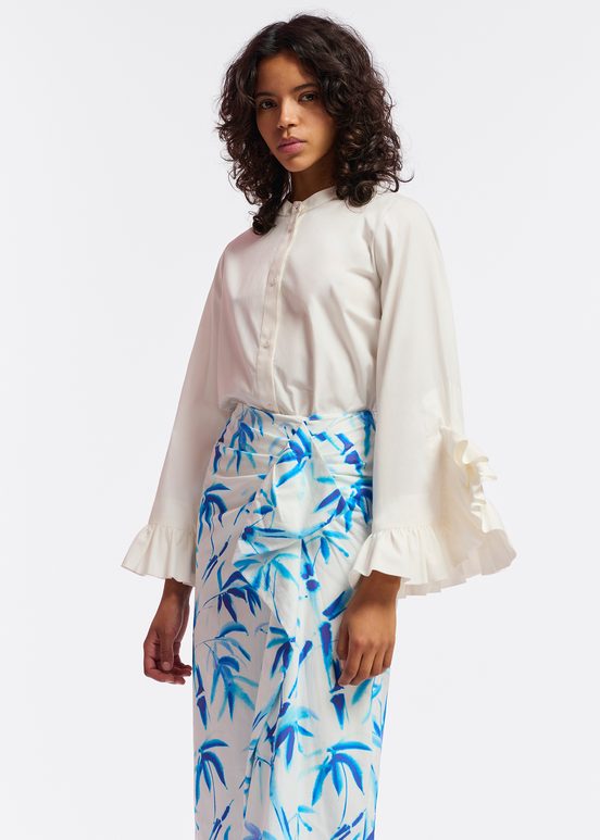 Off-white cotton draped midi skirt with palm leaf print