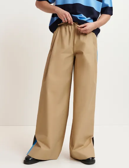 Beige wide-leg pants with blue stripes