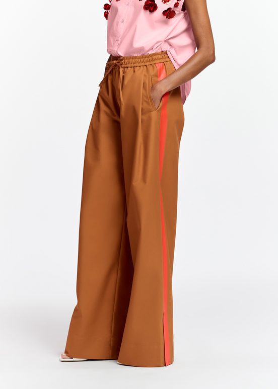 Bronze wide-leg pants with orange stripes