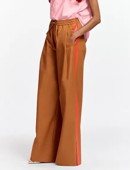 Bronze wide-leg pants with orange stripes