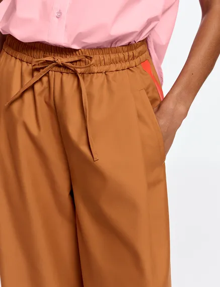 Pantalon large bronze à rayures orange