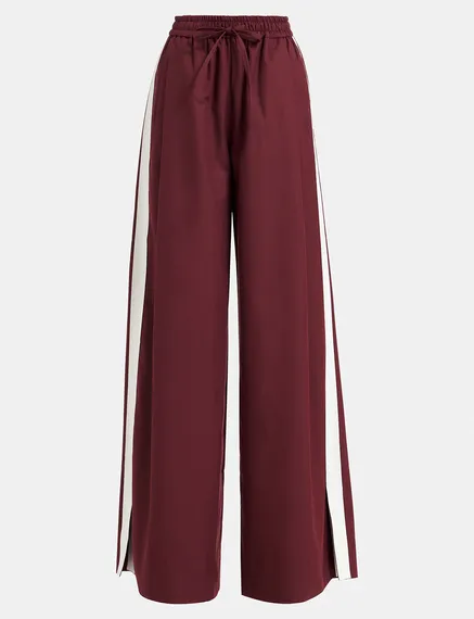 Burgundy wide-leg pants with white stripes