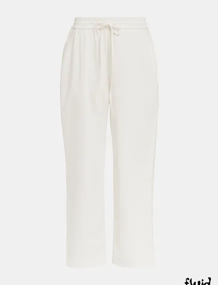 Pantalon blanc cassé à jambes effilées