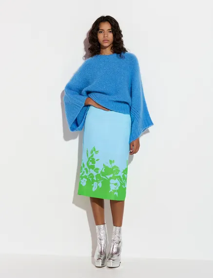 Blue knit sweater with cape effect