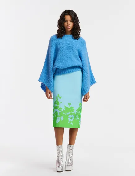 Blue knit sweater with cape effect