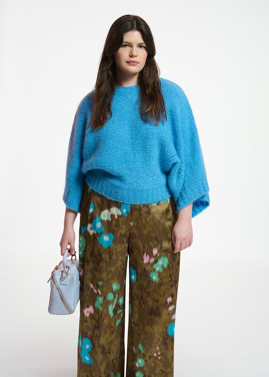 Blue knit sweater with cape effect