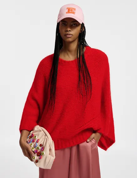 Red knit sweater with cape effect