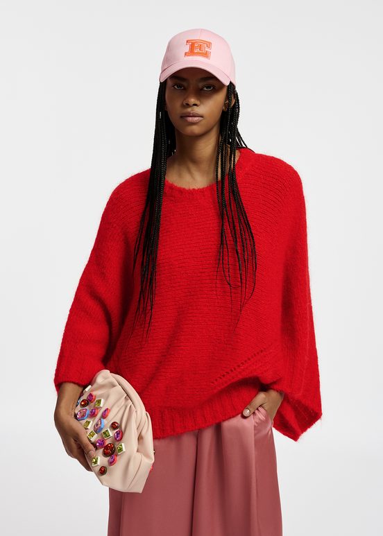 Red knit sweater with cape effect