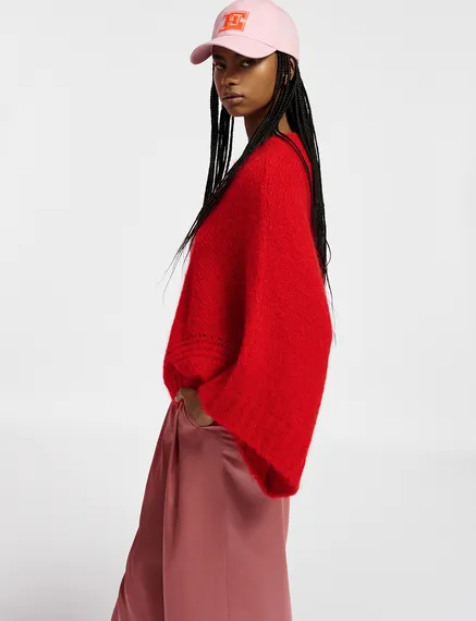 Red knit sweater with cape effect