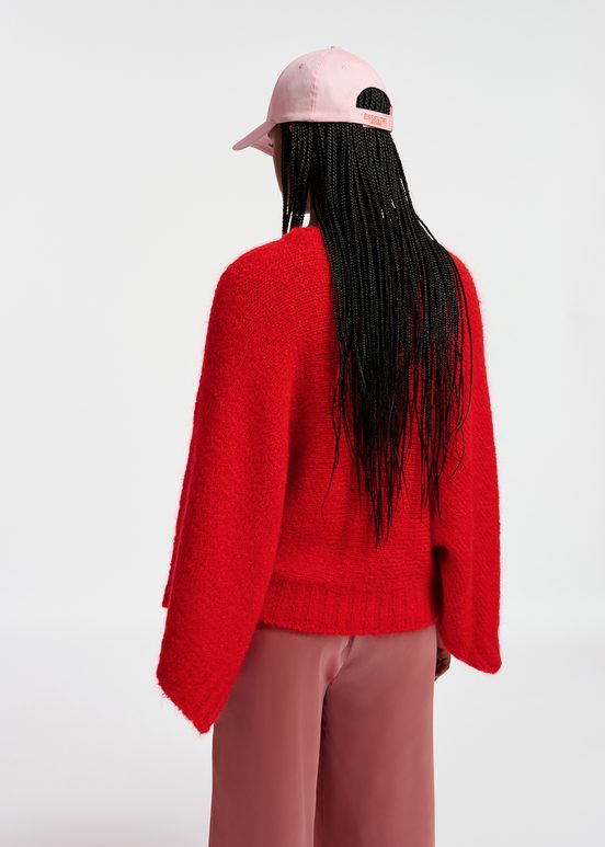 Red knit sweater with cape effect