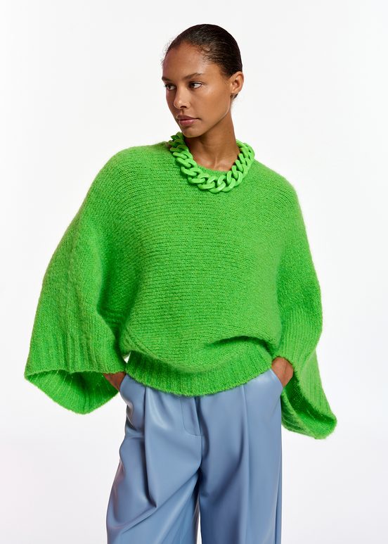 Green knit sweater with cape effect