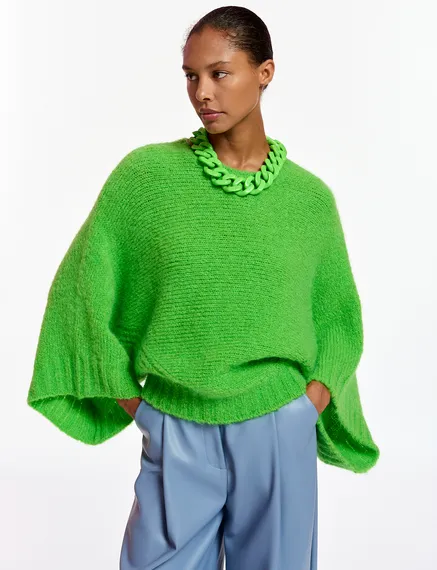 Green knit sweater with cape effect