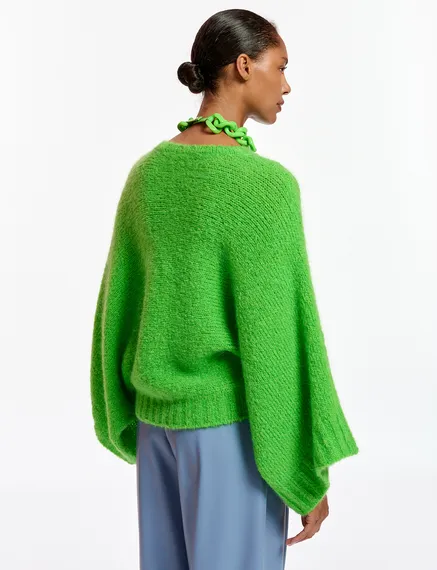 Green knit sweater with cape effect