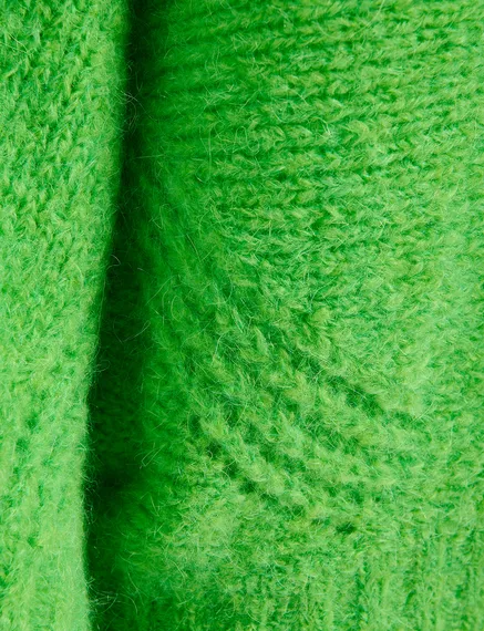 Groene trui met cape-effect