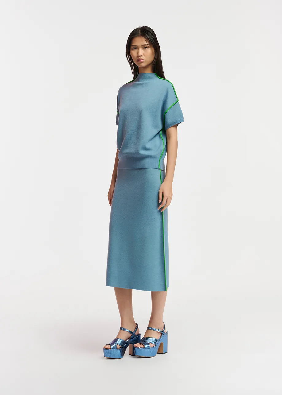 Blue knitted skirt with green piping