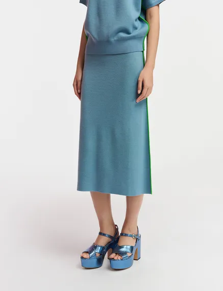 Blue knitted skirt with green piping