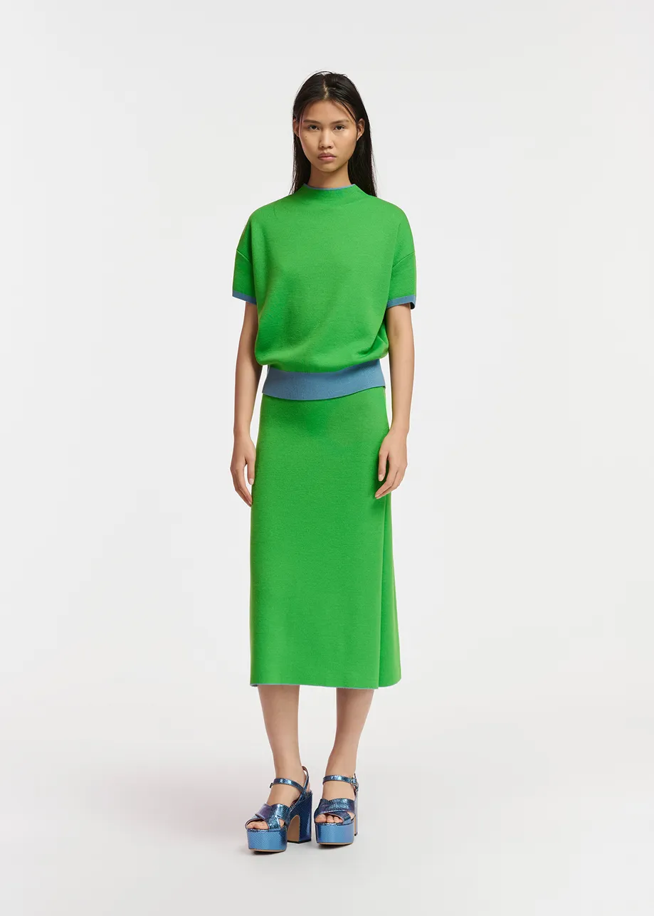 Blue knitted skirt with green piping