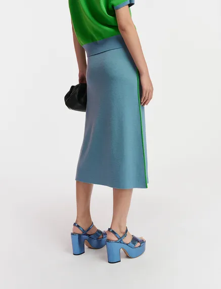 Blue knitted skirt with green piping