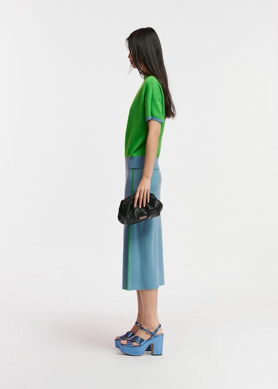 Blue knitted skirt with green piping