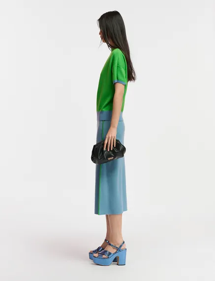 Blue knitted skirt with green piping