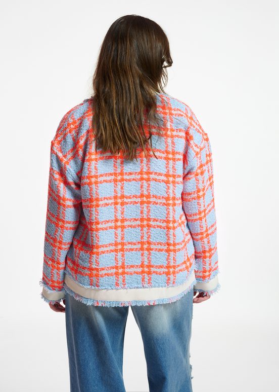 Light blue, neon orange and off-white checked cardigan