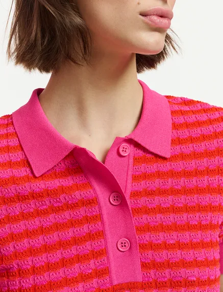 Polo en tricot rayé rose et rouge