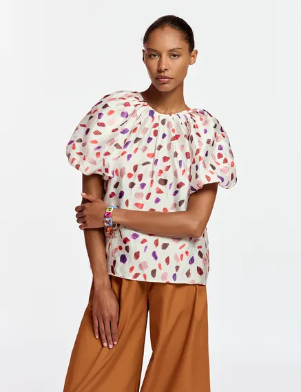 Gebroken witte top met pofmouwen en abstracte print