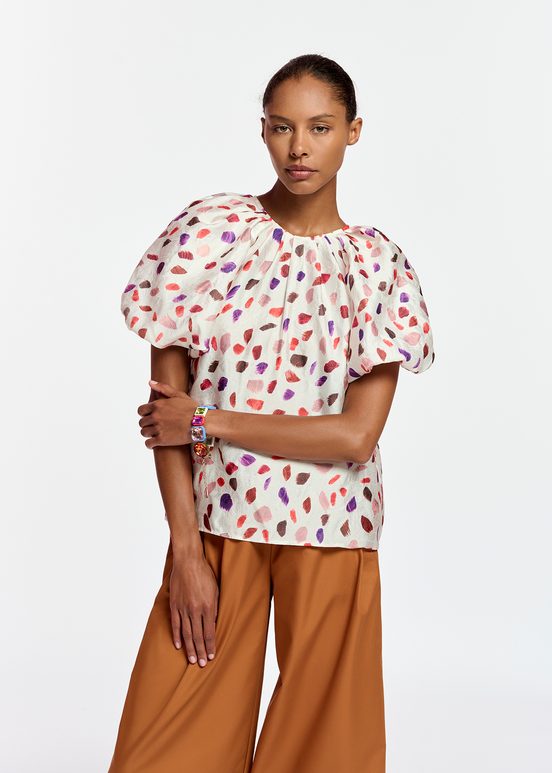 Off-white puffed-sleeve top with abstract print