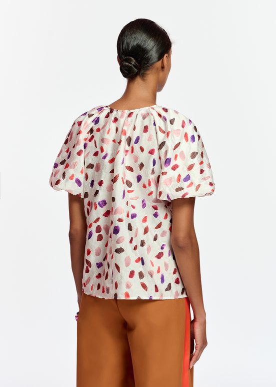 Off-white puffed-sleeve top with abstract print