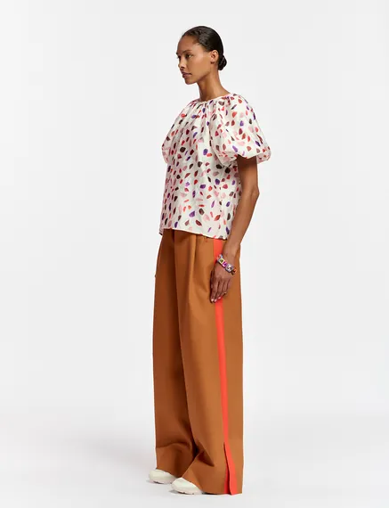 Off-white puffed-sleeve top with abstract print