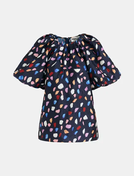 Navy blue puffed-sleeve top with abstract print