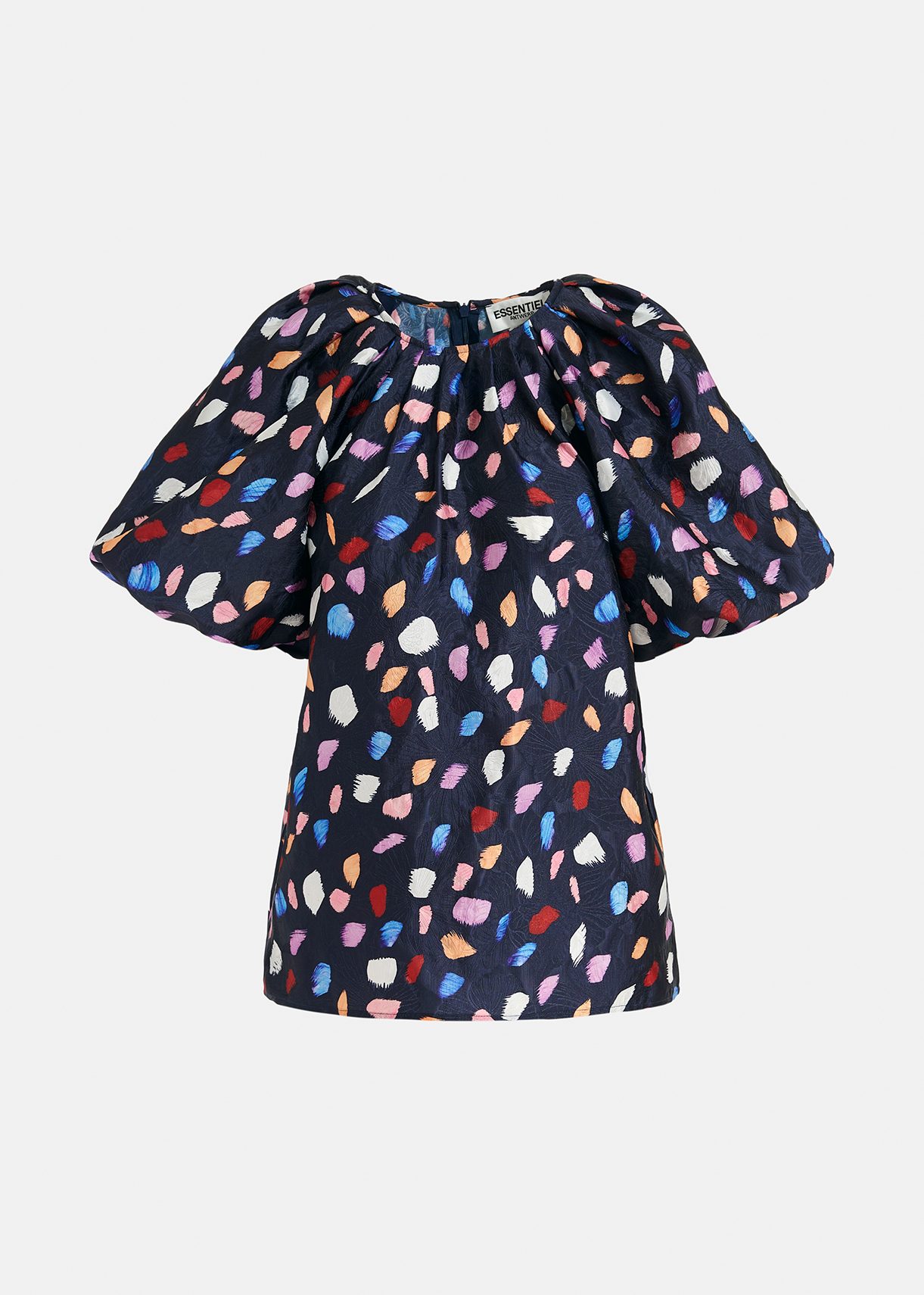 Navy blue puffed-sleeve top with abstract print