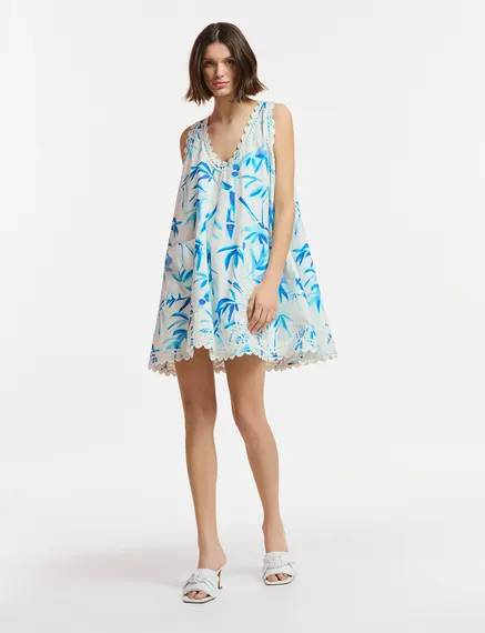 Gebroken witte en blauwe mini-jurk met palmbladerenprint