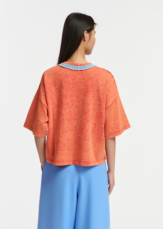 Orange cotton T-shirt with bead-embellished neckline