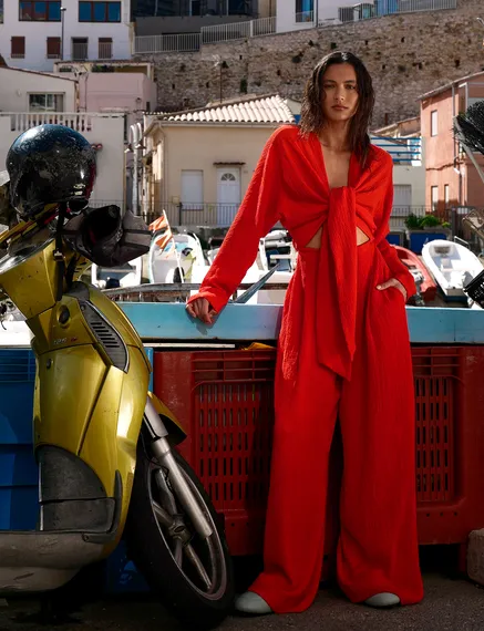 Red seersucker jumpsuit with tied front