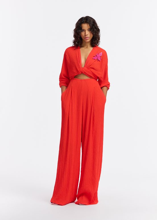 Red seersucker jumpsuit with tied front