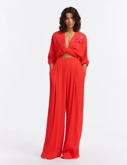 Red seersucker jumpsuit with tied front