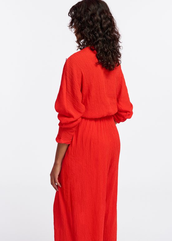 Red seersucker jumpsuit with tied front