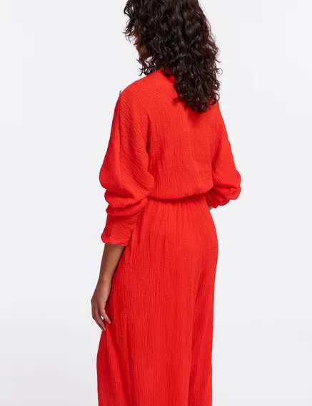 Red seersucker jumpsuit with tied front